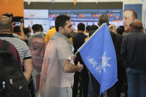 Gaziantep, Türkiye – May 28, 2023. Members of the ruling Justice and Development Party (AKP) follow