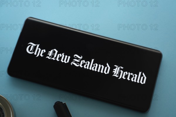 Dhaka, Bangladesh - 18 March 2025: The logo of the new zealand herald is displayed on a smartphone