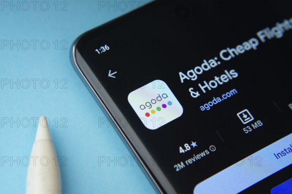 Dhaka, Bangladesh- 27 July 2025: Agoda app from Google Playstore is displayed on a smartphone