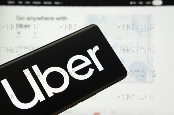 Dhaka, Bangladesh - 18 March 2025: The logo of the Uber is displayed on a smartphone screen, and