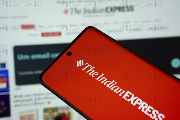 Dhaka, Bangladesh - 18 March 2025: The logo of The Indian Express is displayed on a smartphone