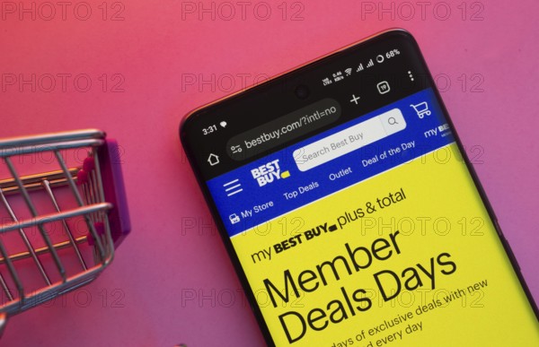 Dhaka, Bangladesh- 23 June 2025: A smartphone displaying the Best Buy website with a shopping cart