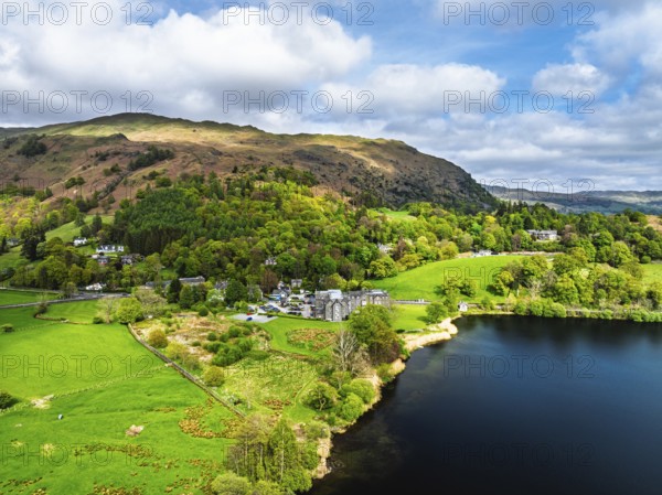 Farms and Mountains over road A591 from a drone, Grasmere Lake, Grasmere, Ambleside, Lake District,