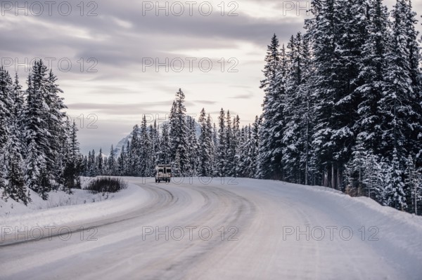 Winter road trip on the Icefields Parkway with lots of snow and ice, Banff National Park, Jasper