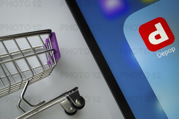 Dhaka, Bangladesh- 05 March 2025: A close up of an iPad screen displaying the depop app alongside a