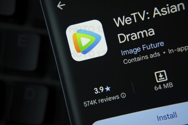 Dhaka, Bangladesh- 27 July 2025: WeTV app from Google Playstore is displayed on a smartphone screen
