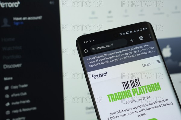 Dhaka, Bangladesh - 15 July 2025: The logo of eToro is displayed on a smartphone screen, and the