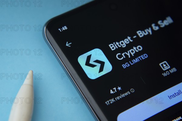 Dhaka, Bangladesh- 27 July 2025: Bitget app from Google Playstore is displayed on a smartphone