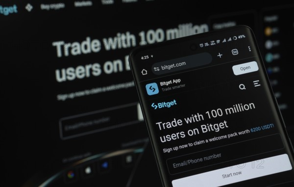 Dhaka, Bangladesh - 27 July 2025: The logo of Bitget is displayed on a smartphone screen, and the