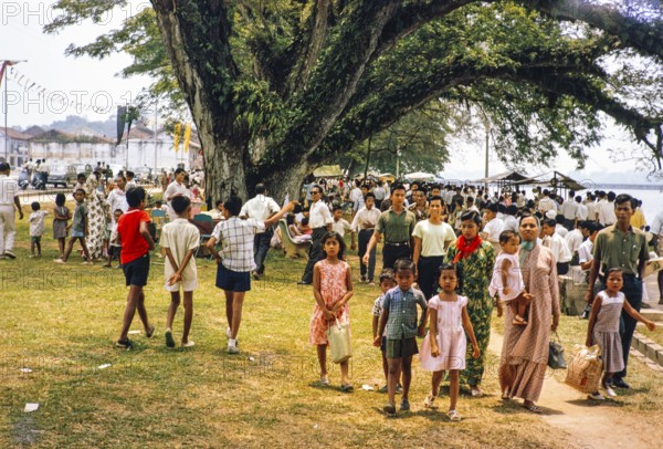 People celebrating having picnics, Waterfront, Johor Bahru, Malaysia, Southeast Asia 1963 - Mawlid