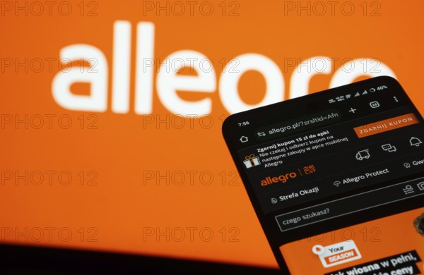 Dhaka, Bangladesh- 03 July 2025: Smartphone displaying Allegro web interface against Allegro logo