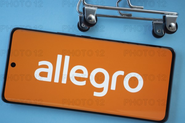 Dhaka, Bangladesh- 03 July 2025: Smartphone screen showing the Allegro logo with shopping cart
