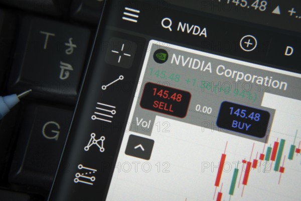 Dhaka, Bangladesh- 20 June 2025: Nvidia corporation stock trading details on smartphone over a