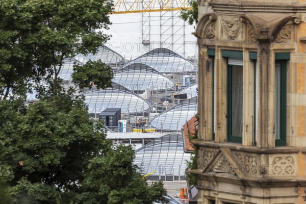 Stuttgart 21. construction site at the new through station. A glass roof construction provides the
