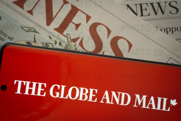 Dhaka, Bangladesh - 18 March 2025: The logo of The Globe And Mail is displayed on a smartphone