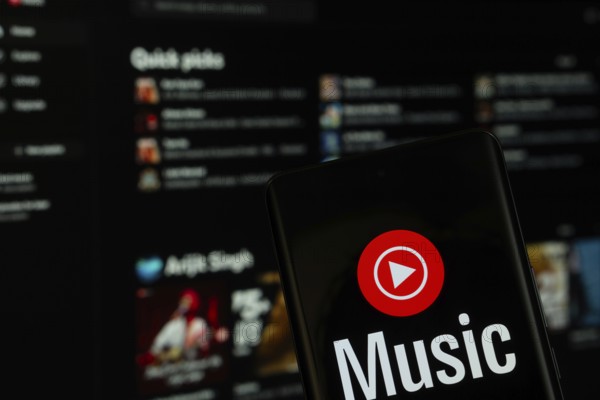 Dhaka, Bangladesh- 04 July 2025: Youtube Music logo is displayed on a smartphone screen, with the