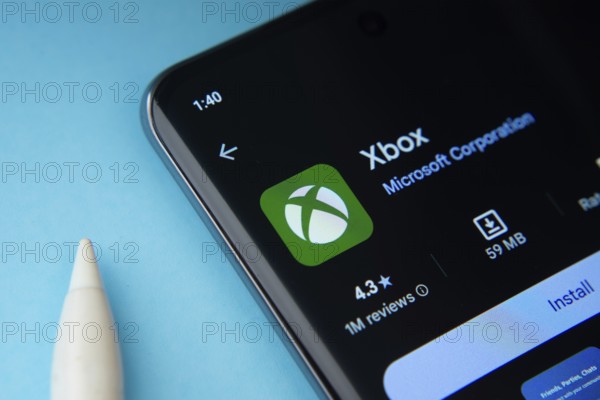 Dhaka, Bangladesh- 04 July 2025: The Xbox app from Google Playstore is displayed on a smartphone