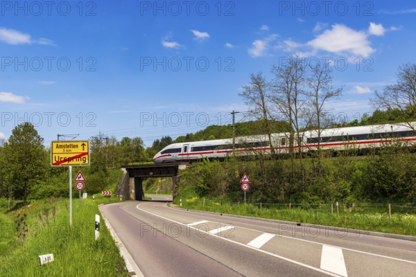 InterCityExpress ICE en route on the Swabian Alb near Lonsee. Landscape with railway bridge near