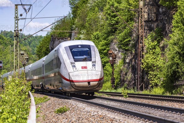 InterCityExpress ICE en route on the winding railway line of the Geislinger Steige. Landscape on