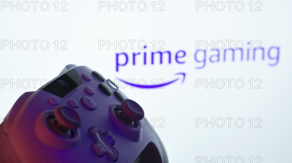 Dhaka, Bangladesh- 22 June 2025: A close-up of a white gamepad with the Prime Gaming seen on screen