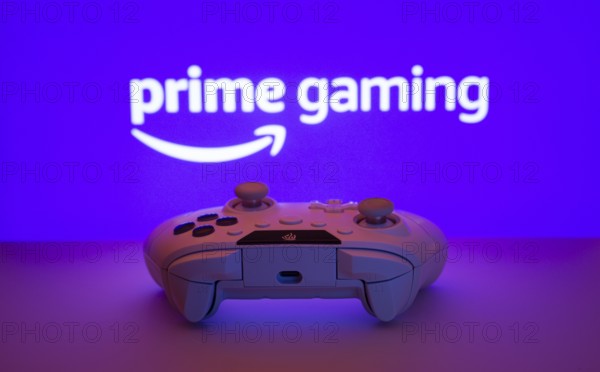 Dhaka, Bangladesh- 22 June 2025: A close-up of a white gamepad with the Prime gaming seen on screen