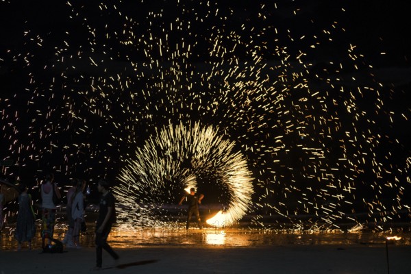 Fire show, jugglers with fire, Ao Nang Beach, sunset, Ao Nang, Krabi, Thailand