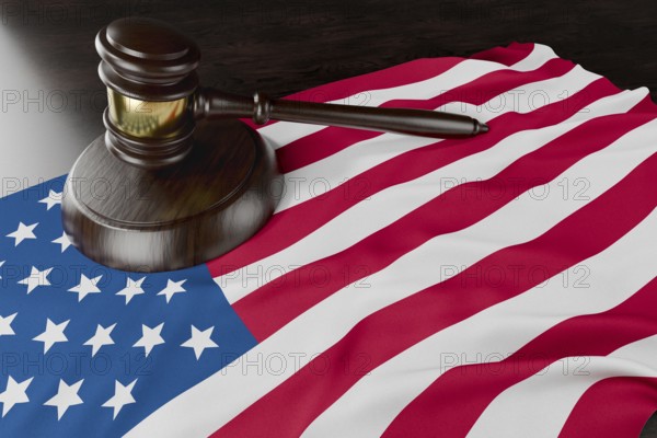 American flag and wooden gavel resting on desk