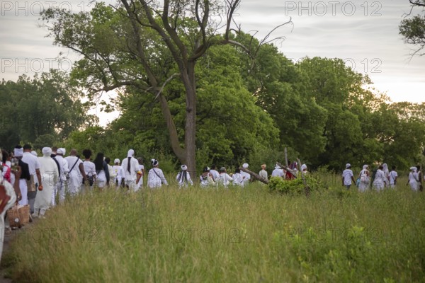 Detroit, Michigan - African-Americans gather on the banks of the Detroit River to commemorate