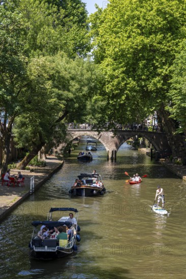 The old town centre of Utrecht, Oudegracht, around 2 km long with many old houses, shops,