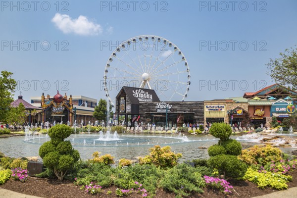 The Wheel ferris wheel behind the Ole Smoky Moonshine store at The Island recreation center in