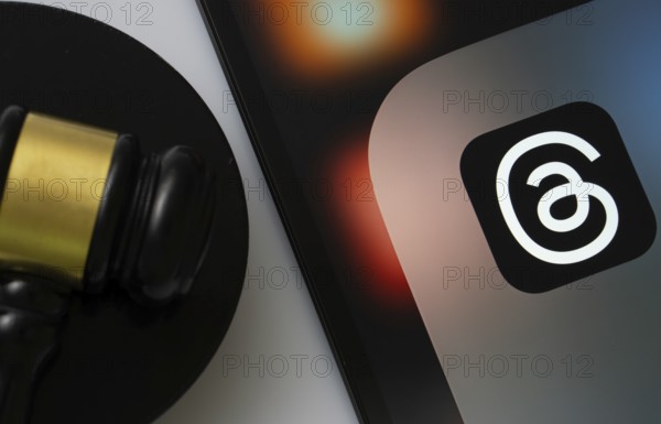 Dhaka, Bangladesh- 18 March 2025: A close up of an iPad screen displaying the threads app alongside