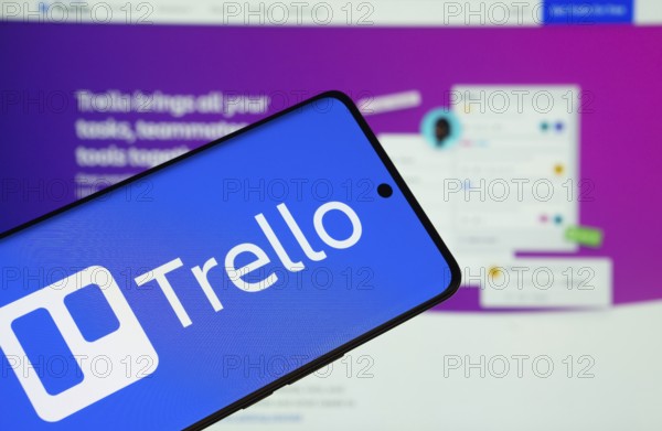Dhaka, Bangladesh - 18 March 2025: The logo of the trello is displayed on a smartphone screen, and