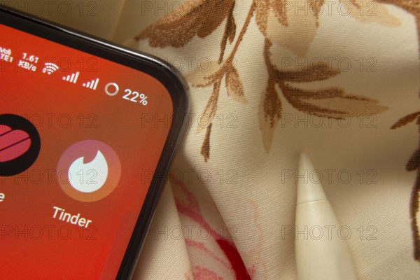 Dhaka, Bangladesh- 07 May 2025: Tinder app icon is seen on smartphone