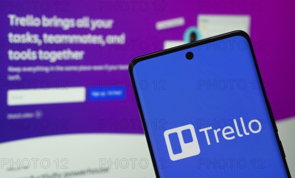 Dhaka, Bangladesh - 18 March 2025: The logo of the trello is displayed on a smartphone screen, and
