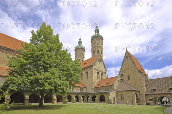 Late Romanesque UNESCO Cathedral of St Peter and St Paul with twin towers, inner courtyard with