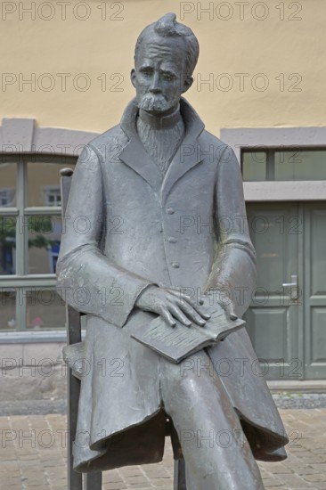 Monument to philosopher Friedrich Nietzsche, bronze sculpture, modern art, standing female figure,