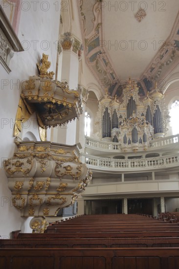 Pulpit with pulpit lid and organ of the baroque town church, pulpit bonnet, sounding board, pulpit