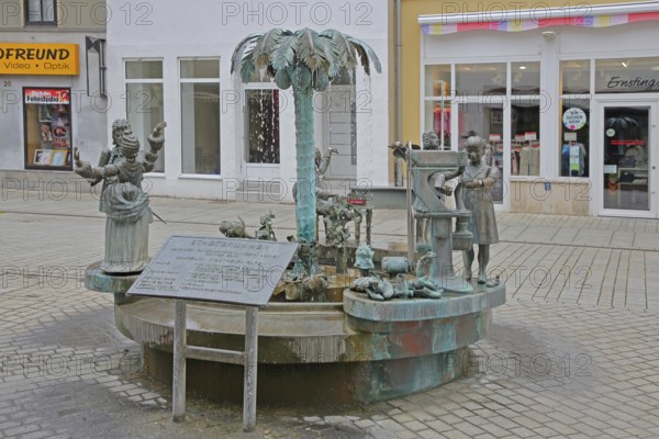 City fountain by Bonifatius Stirnberg 2000, bronze sculptures on the historical city history with
