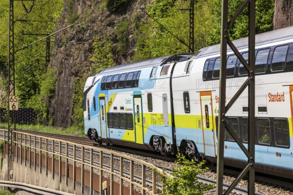 Train of the Austrian Westbahn en route on the winding railway line of the Geislinger Steige.