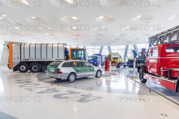 Gallery of helpers with rescue and police vehicles. The Mercedes-Benz Museum in Stuttgart presents