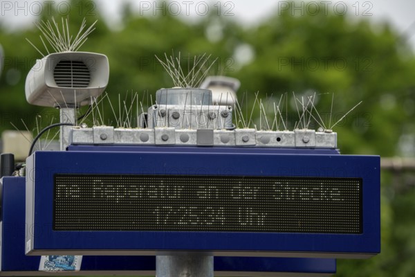 Display board, at a station, train cancellation announcement due to construction work, display