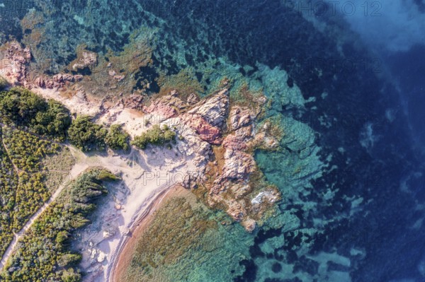 Aerial view, colourful rocks in the sea, rocky bay, Corsica, France