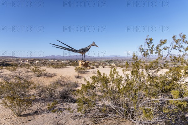 Giant Recycled Roadrunner statue made entirely from discarded materials by artist Olin Calk at an