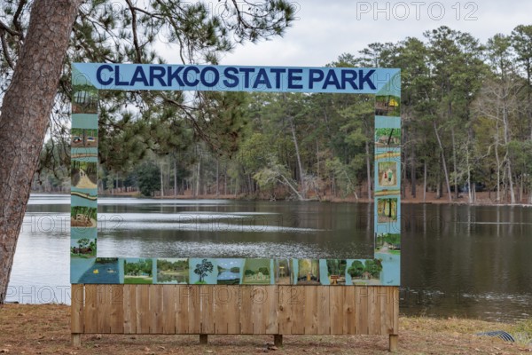 Permanent painte wooden photo prop beside Lake Ivy at Clarko State Park near Quitman, Mississippi,