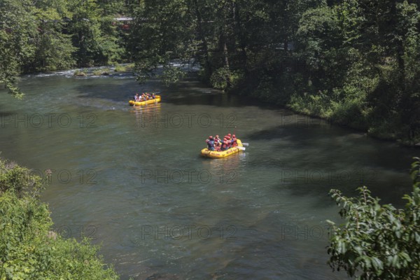 Rafters on the Nantahala River as seen from the Great Smoky Mountains Railroad which runs next to