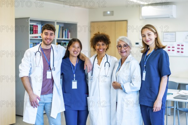 Doctors and nurses standing together in a hospital corridor, demonstrating teamwork and
