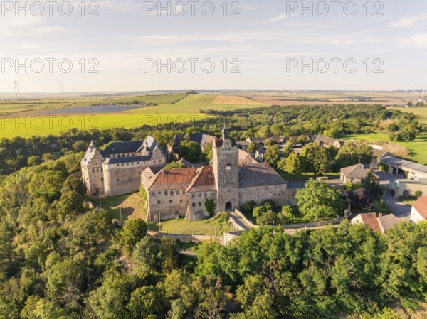 Aerial view of a historic medieval castle surrounded by green countryside, Allstedt, Harz, Germany