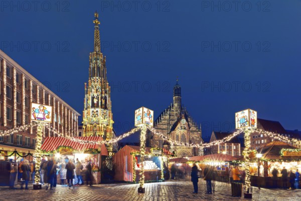 From left back: New Town Hall, Beautiful Fountain, Church of Our Lady, front: garlands, visitors,