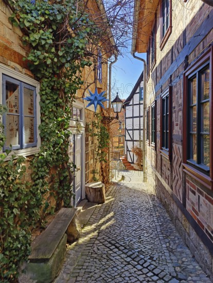 Narrow, romantic passageway with half-timbered houses on the Schlossberg, Old Town of the World