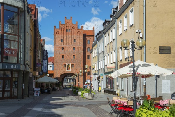 Maler's Old Town Lane with historic brick houses and cosy alleyway cafés, High Tor, Upper Tor, Old